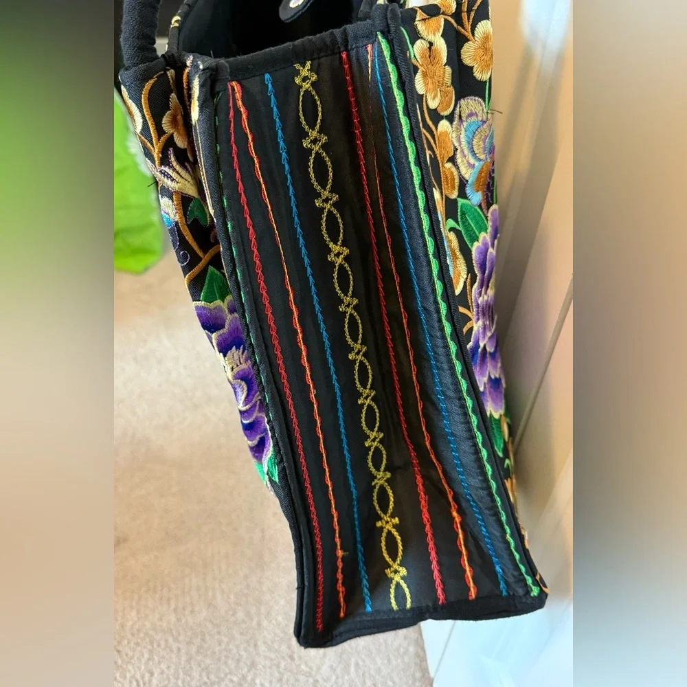 Tote with embroidered purple flowers
